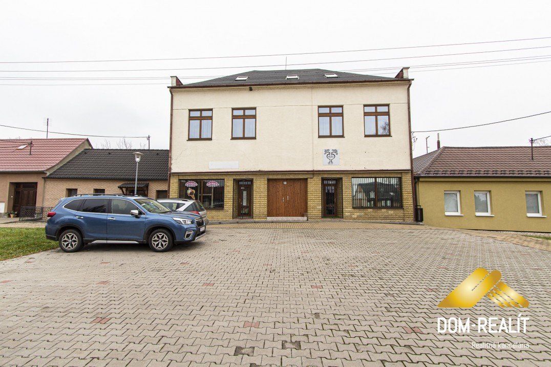 Nehnutelnost DOM-REALÍT ponúka polyfunkčný objekt: 3bytové jednotky, 2 obchodné priestory a záhrada s posedením